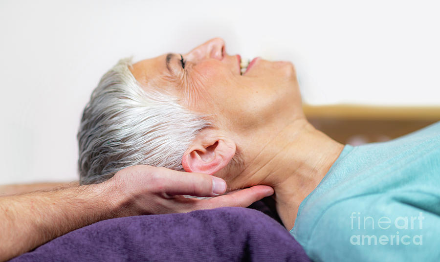 Physical Therapist Stretching Senior Womans Neck #2 Photograph by Microgen Images/science Photo Library