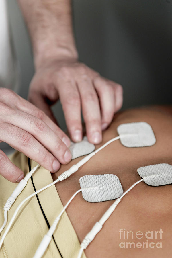 Physical Therapy Photograph - Placing Tens Electrodes On Upper Back #2 by Microgen Images/science Photo Library
