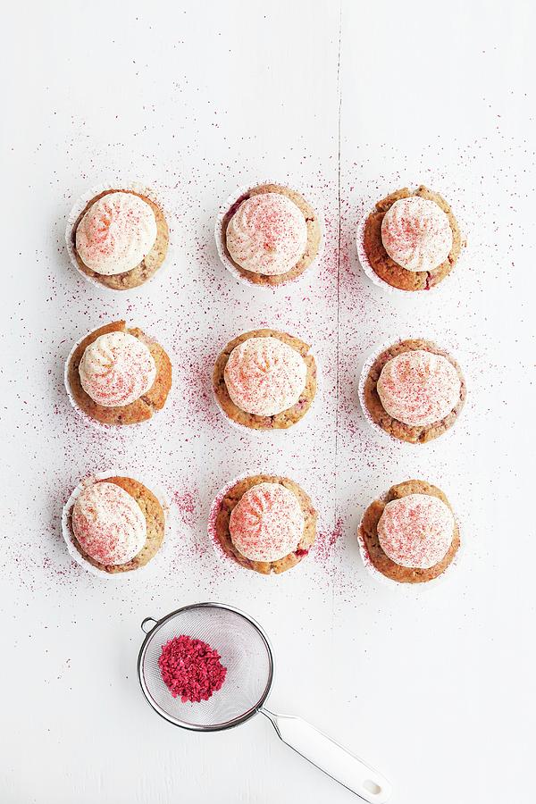 Raspberry And Almond Muffins Decorated With Buttercream And Dried Raspberry Powder #2 Photograph by Sarah Coghill