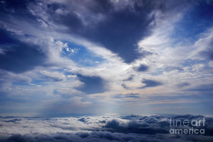 Scene of a winter cloudy sky from the top of a mountain peak. #3 Photograph by Joaquin Corbalan
