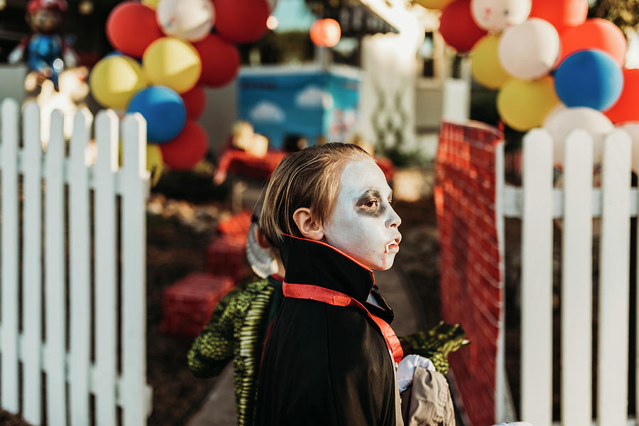 School Aged Boy Dressed As Dracula Trick-or-treating During Halloween ...