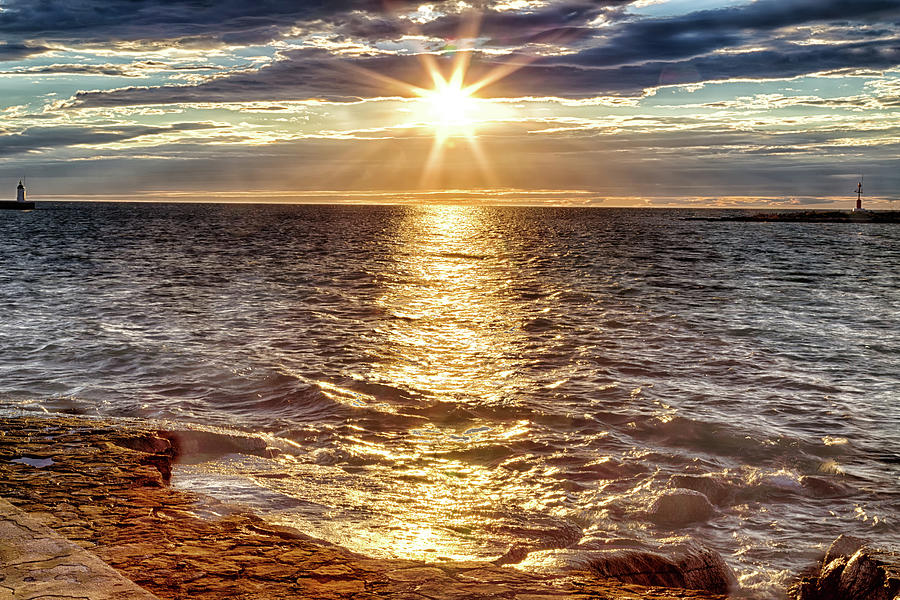 Sunset on sea rocks Photograph by Vivida Photo PC