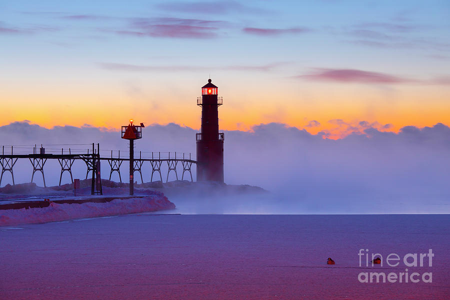 The Beautiful Algoma Wisconsin Lighthouse stands Sentinel in glowing 