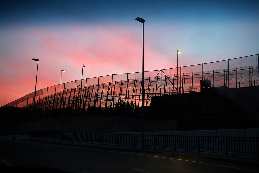 The Border Fence Between Morocco Photograph by Juan Medina - Fine Art ...