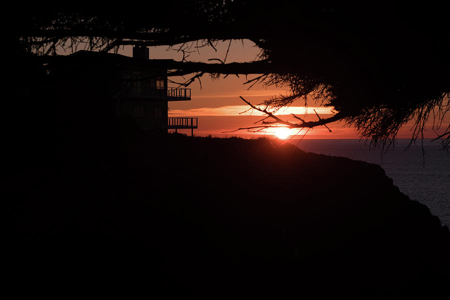 The Sun Setting On The Horizon Near Ben Jones Bridge Viewpoint, Oregon, Usa Photograph