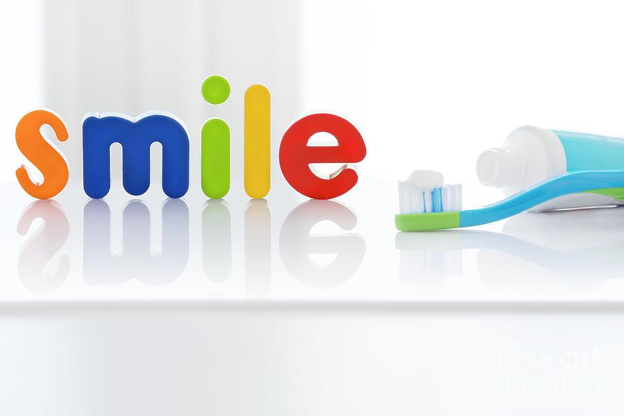 The Word smile In Multicoloured Letters With Toothbrush #2 Photograph by Science Photo Library