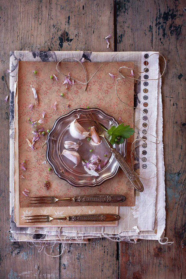 Vintage-style Arrangement With Garlic Cloves #2 Photograph by Alicja Koll