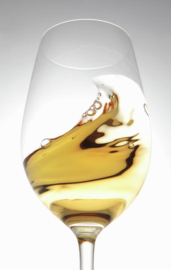 White Wine In A Glass With A Wave #2 Photograph by Peter Garten