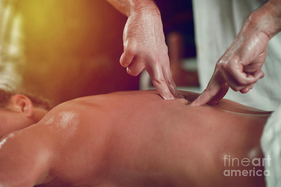 Relax Lower Back Massage Stock Photo by microgen