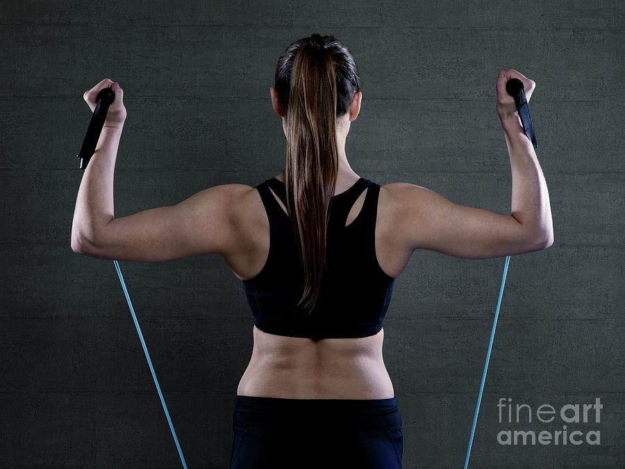 Woman With Resistance Band #2 Photograph by Science Photo Library