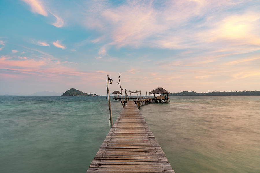 Sunset Photograph - Wooden Bar In Sea And Hut With Clear #2 by Prasit Rodphan