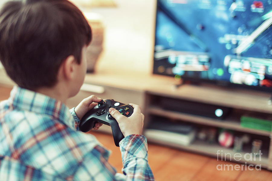 Young Boy Playing Video Game #2 Photograph by Sakkmesterke/science Photo Library