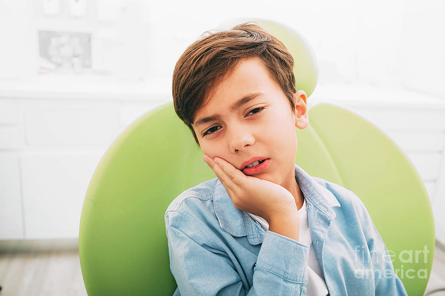 Young Boy With Toothache #2 Photograph by Peakstock / Science Photo Library