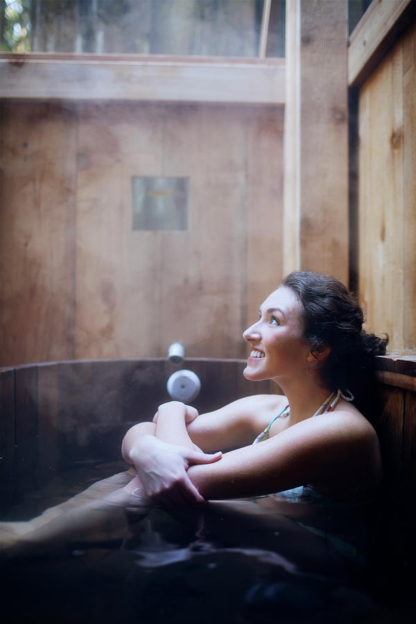 Nature Photograph - Young Smiling Woman At Sauna #2 by Cavan Images