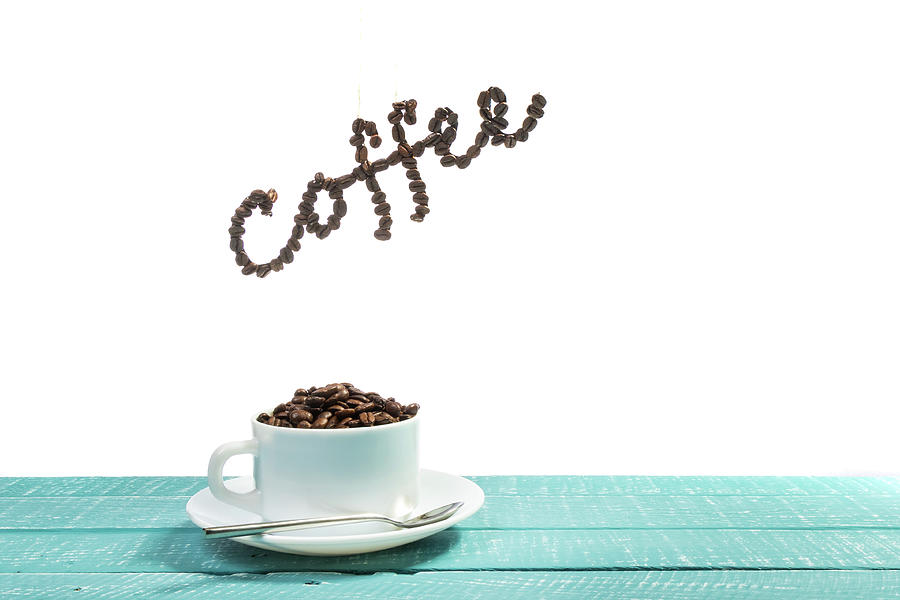 Coffee on a blue weathered table by Ben Gingell Coffee on a blue weathered table by Ben Gingell