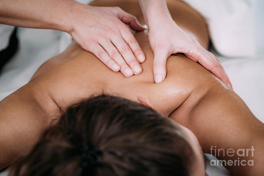 Shoulder massage - Stock Image - F025/0058 - Science Photo Library