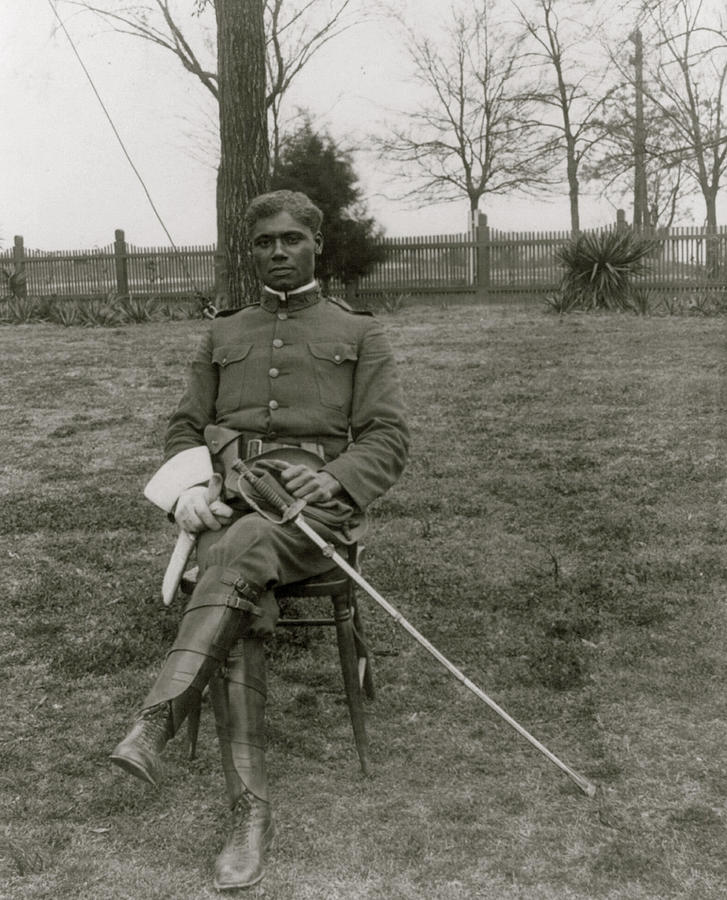 Negroes Painting - 25th anniversary of Tuskegee Inst., Ala., 1906: Young man in uniform seated on lawn by 