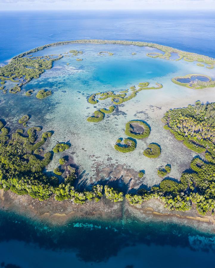 A Remote Tropical Island In The Molucca Photograph by Ethan Daniels ...