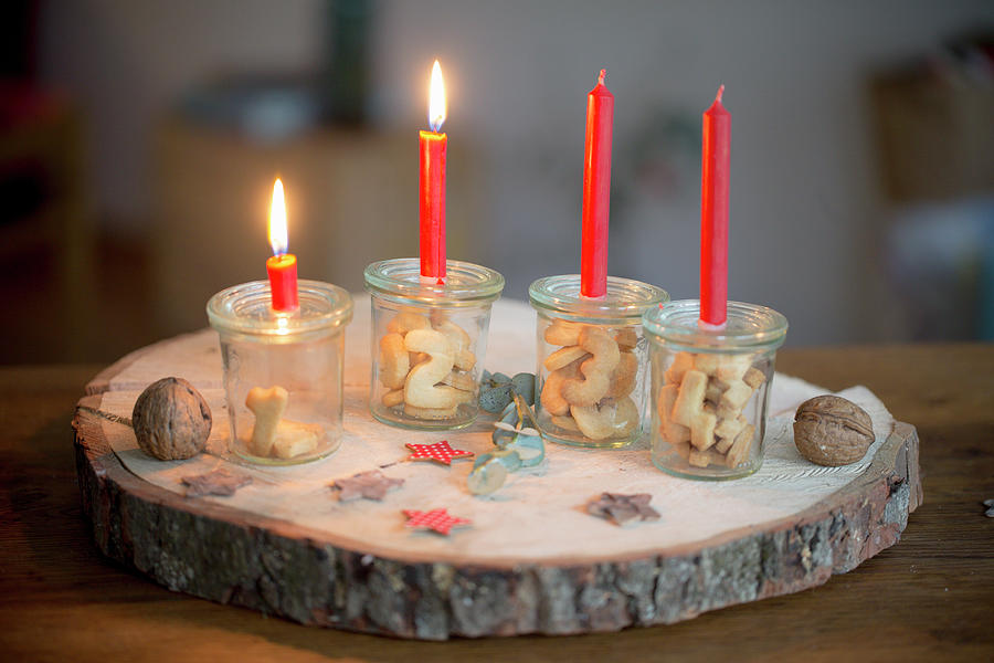 Alternative Advent Wreath Made From Candles On Mason Jars Containing Biscuit Numbers 1-4 #3 Photograph by Iris Wolf