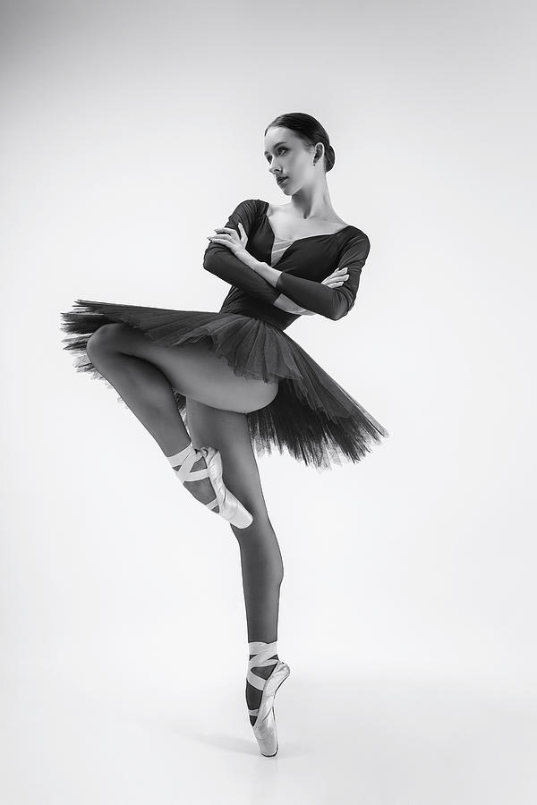 Black Swan. Ballerina In A Black Tutu Shows Elements Of Ballet Dance In Motion #3 Photograph by Alexandr