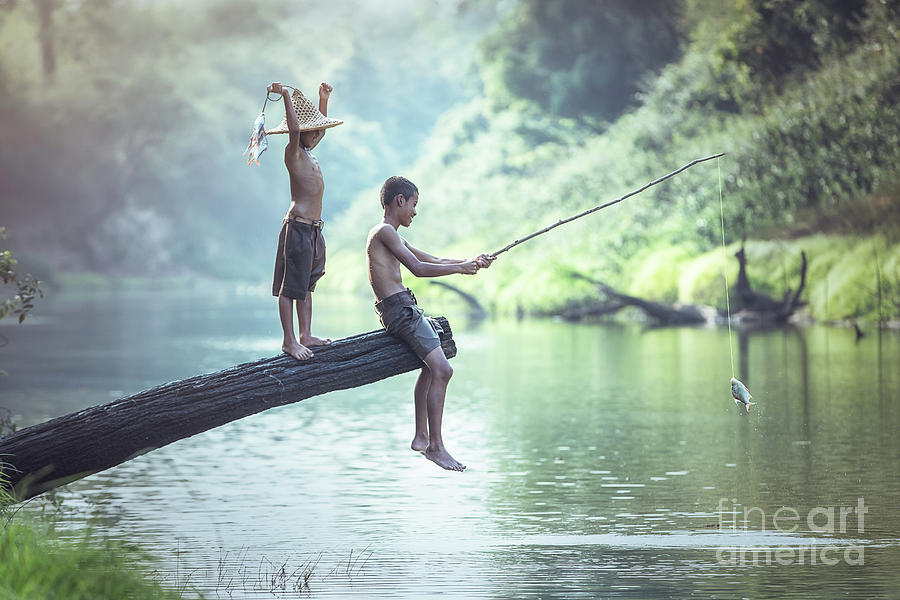 Boy fishing at the river #3 by Sasin Tipchai