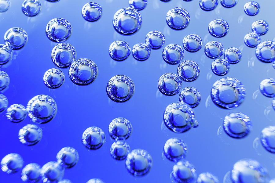 Bubbles Of Mineral Water Close-up. Macro Photo In Blue Shades. Backgro ...