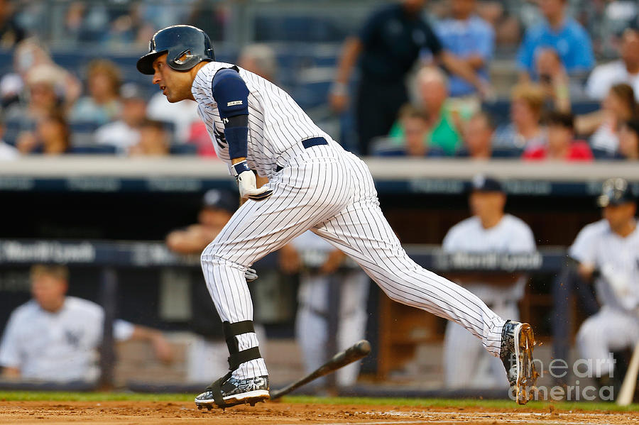 Cleveland Indians V New York Yankees Photograph by Mike Stobe Cleveland Indians V New York Yankees Photograph by Mike Stobe
