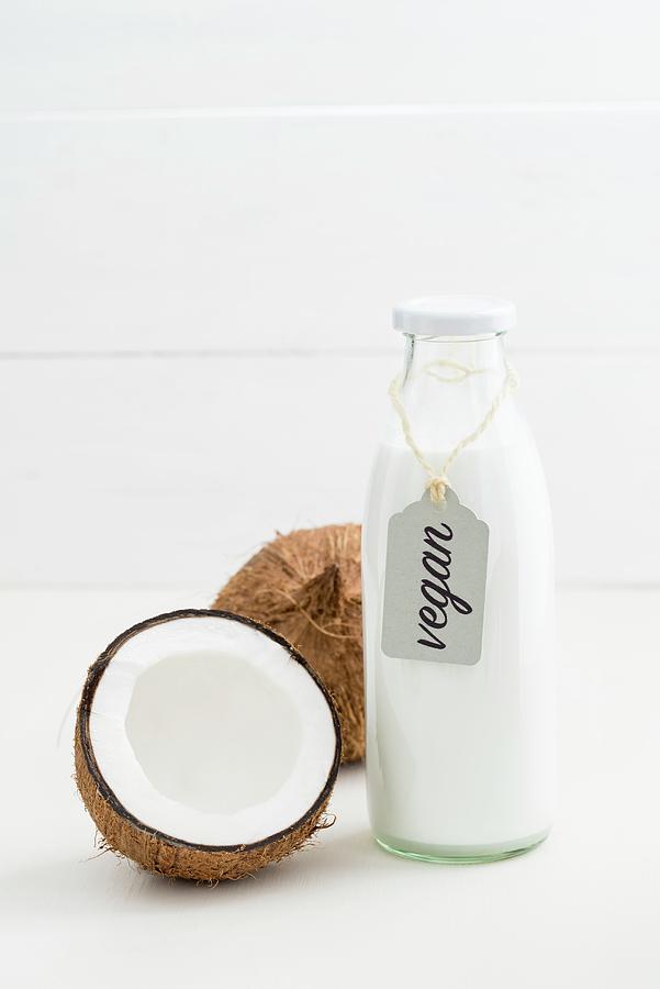 Coconut Milk In A Glass Bottle With A Label #3 Photograph by Elisabeth Clfen