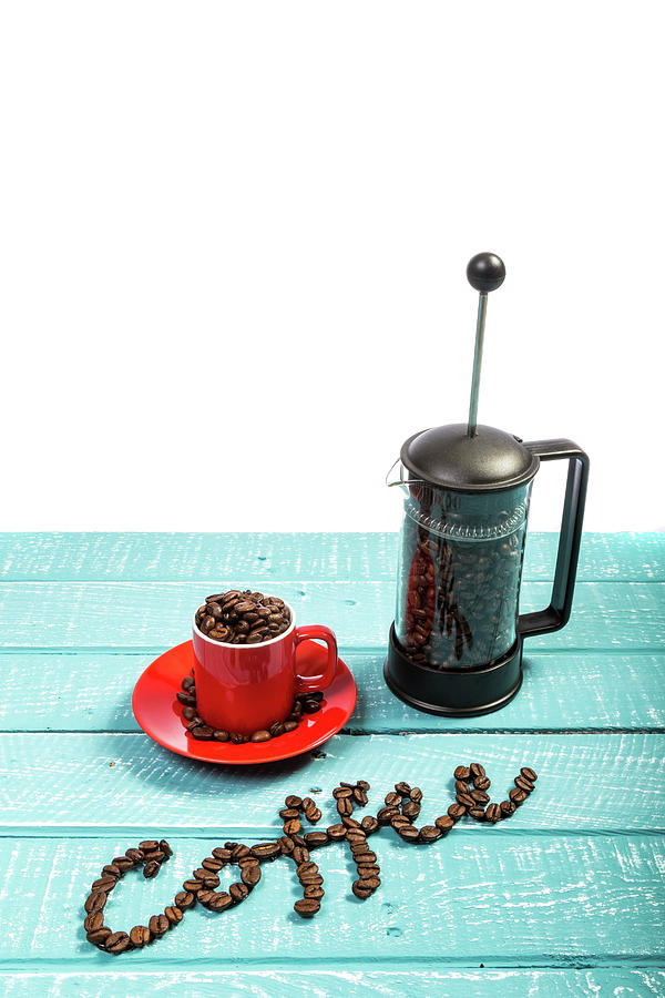 Coffee on a blue weathered table by Ben Gingell Coffee on a blue weathered table by Ben Gingell