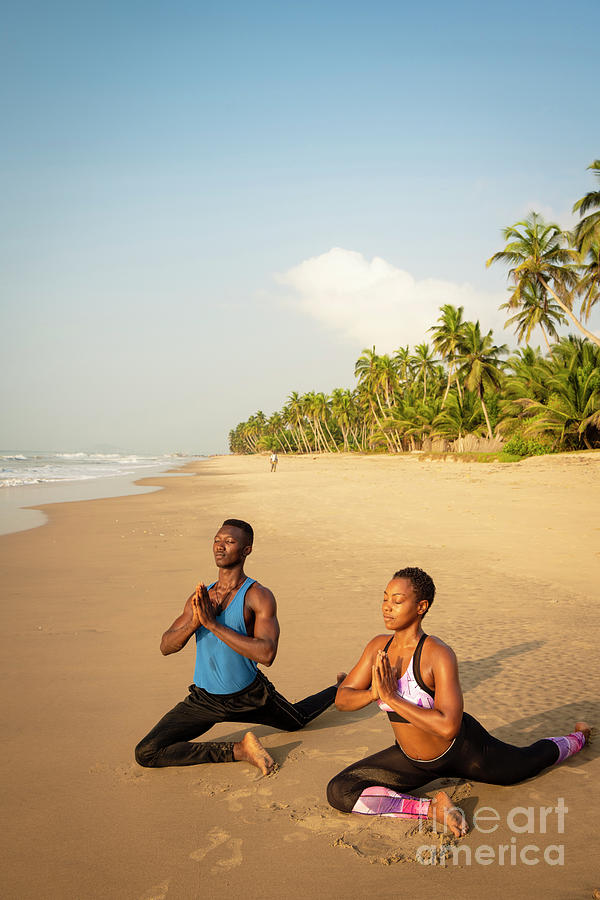 Couple Practising Yoga On Beach #3 Photograph by Ben Pipe Photography