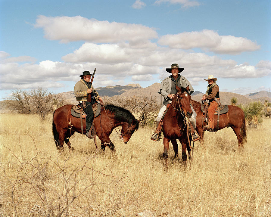 Cowboys Riding On Horses #3 Photograph by Matthias Clamer