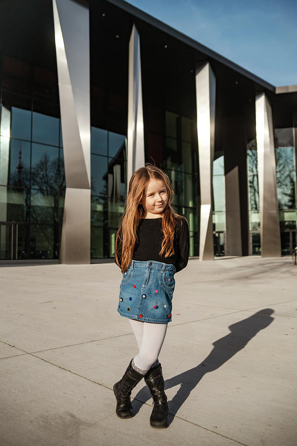 Cute Little Girl With Long Hair Posing In The Sun #3 Photograph by