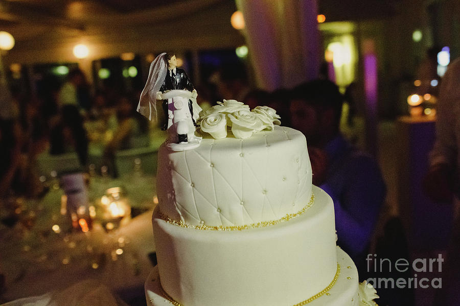 Desserts and wedding cake with very sweet cupcakes at an event. #3 Photograph by Joaquin Corbalan