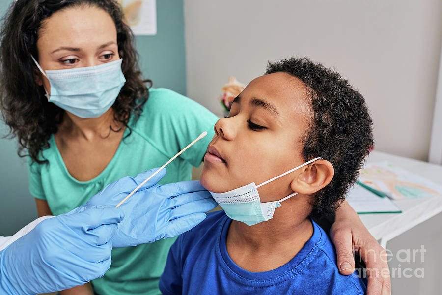 Doctor Taking Nasal Swab #3 by Peakstock / Science Photo Library