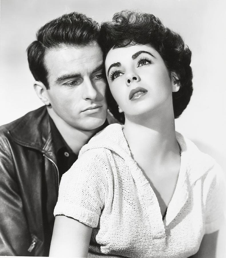 ELIZABETH TAYLOR and MONTGOMERY CLIFT in A PLACE IN THE SUN -1951-.  Photograph by Album