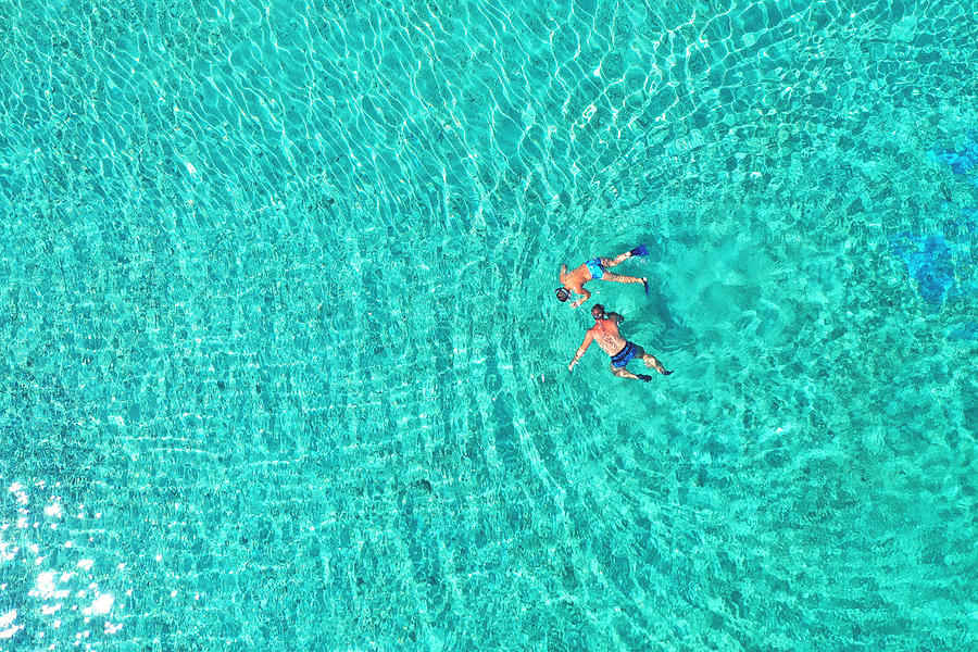 Father And Son Snorkels Photograph by Daniel Chetroni - Fine Art America