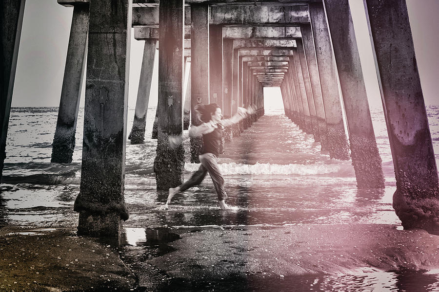 Juno Digital Art - Florida, South Florida, Woman Running Under The Juno Beach Pier #3 by Laura Diez