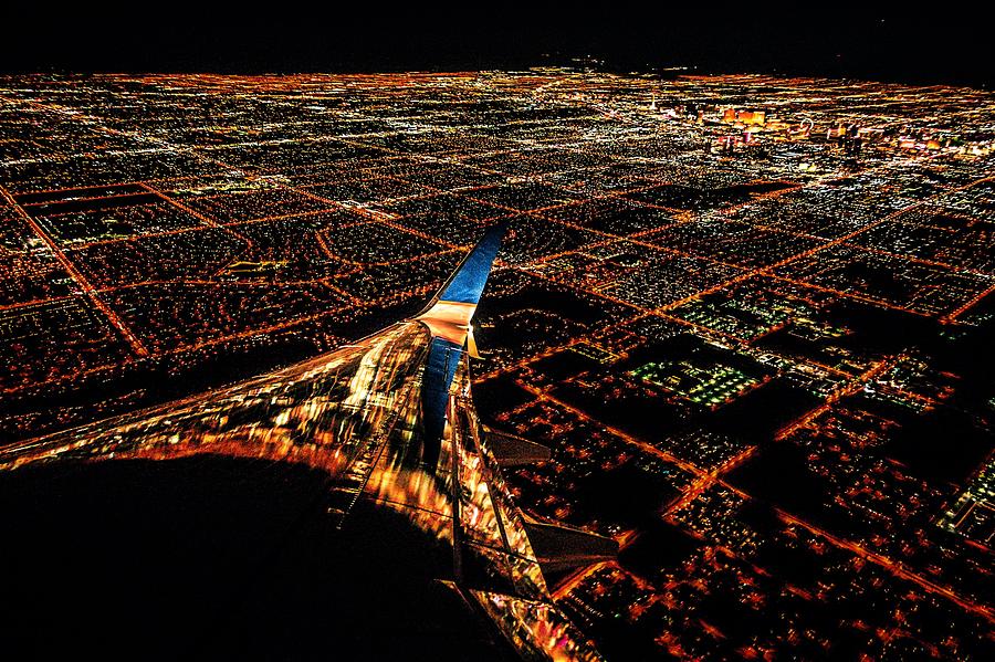 Las Vegas City lights from airplane at night by Alex Grichenko