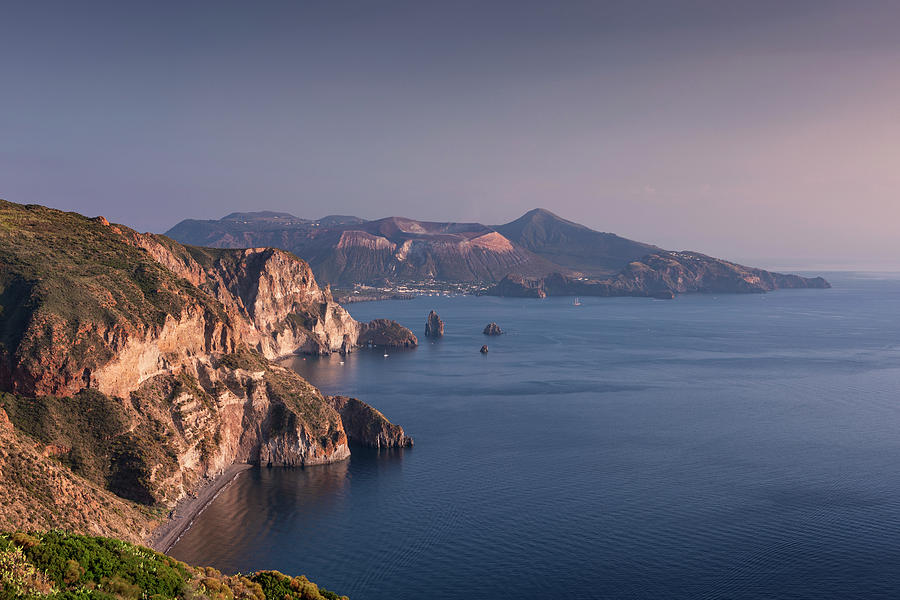 Lipari Coastline With View Of Vulcano Volcanic Island In Sunset, Sicily Italy #3 Photograph by Bastian Linder