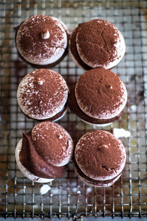 Macaroons With Chocolate Cream And Cocoa Powder #3 Photograph by Eising Studio
