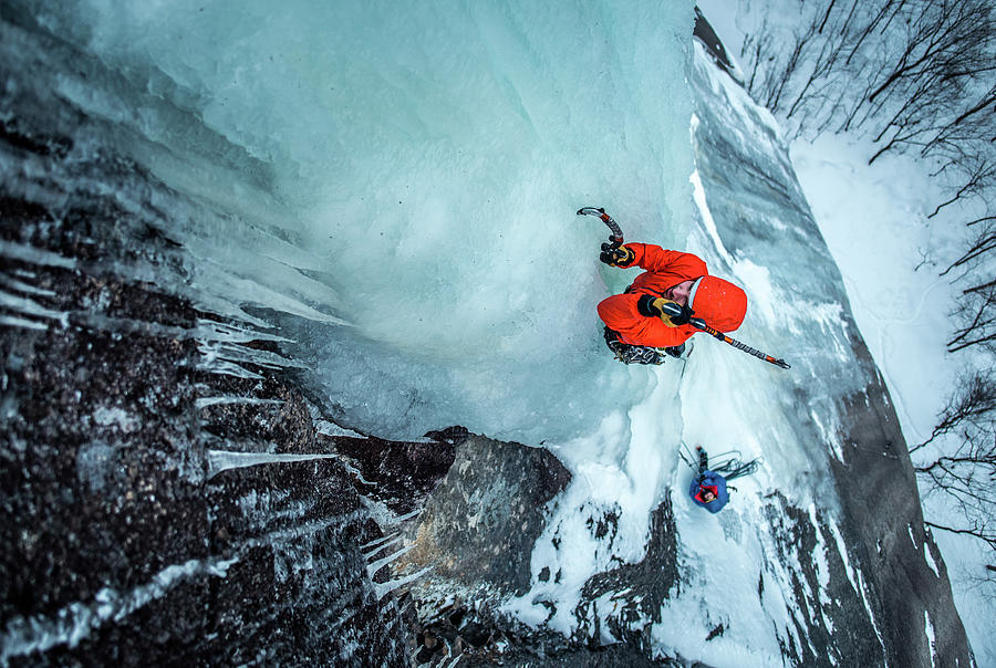 Man Ice Climbing On Cathedral Ledge In North Conway, New Hampshire ...