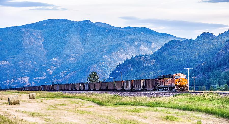 Montana landscapes with heavy train engine locomotive passing #3 Photograph by Alex Grichenko