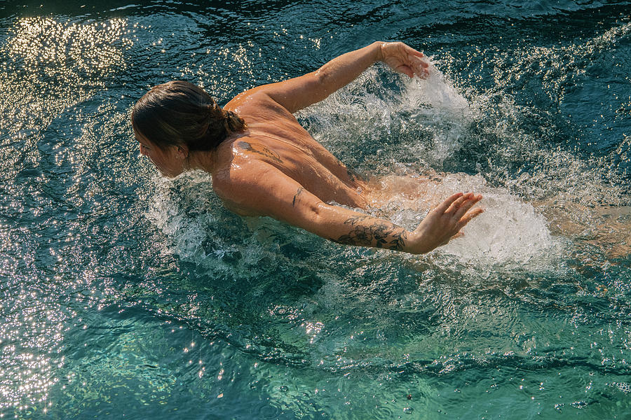 Naked Woman With Tattoos Swimming #3 Photograph by Panoramic Images