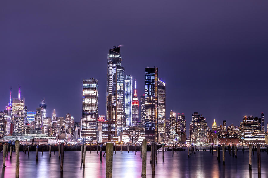 New York City Manhattan Midtown Panorama at Night with Skyscrapers illuminated over Hudson River. #3 Photograph by Jay De Winne