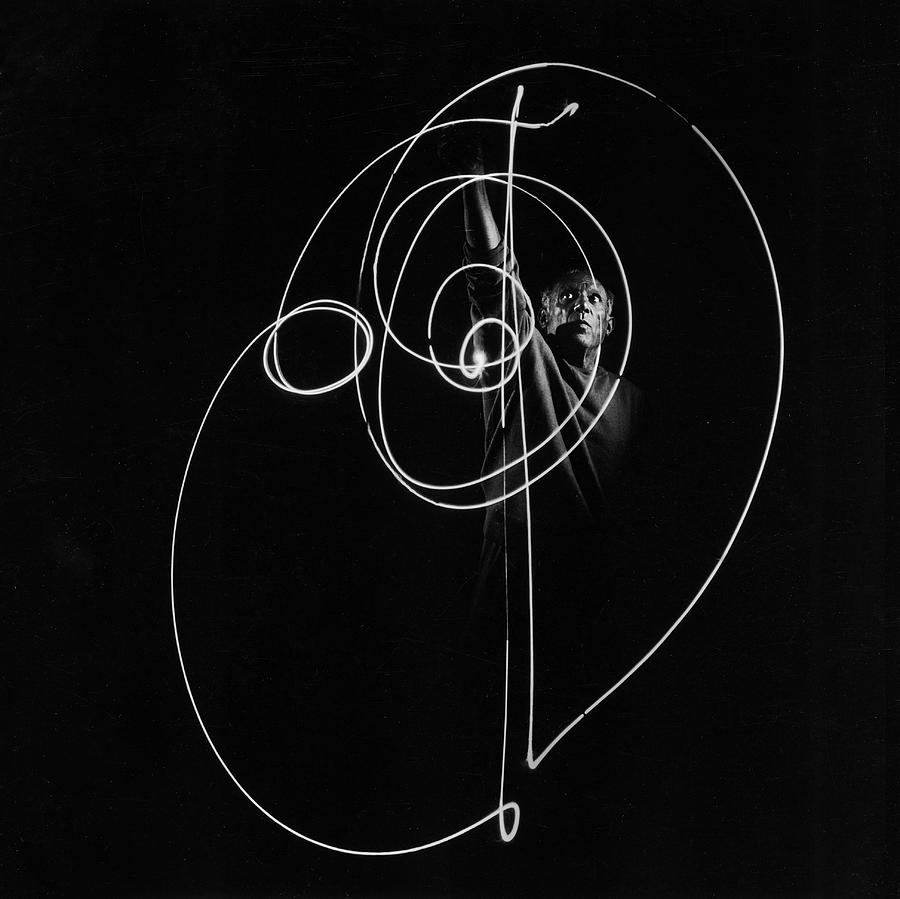 Black And White Photograph - Pablo Picasso Works With Light by Gjon Mili