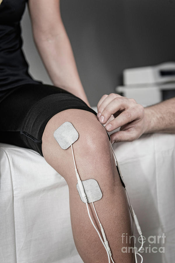 Physical Therapy Photograph - Placing Tens Electrodes On Knee #3 by Microgen Images/science Photo Library