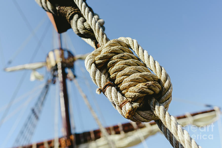 Rigging and ropes on an old sailing ship to sail in summer. #3 Photograph by Joaquin Corbalan
