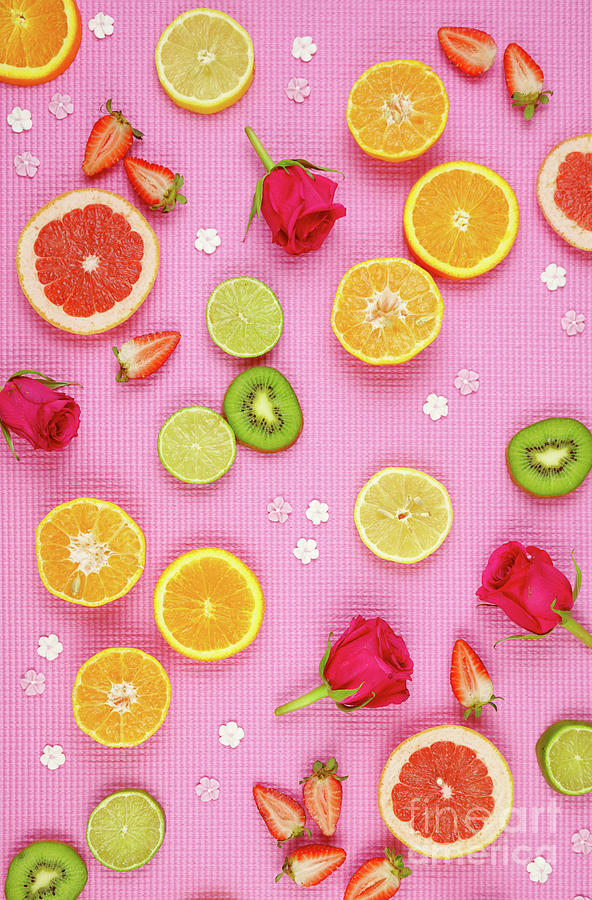 Summer theme background with fruit, citrus and flowers on pink backdrop. #3 Photograph by Milleflore Images