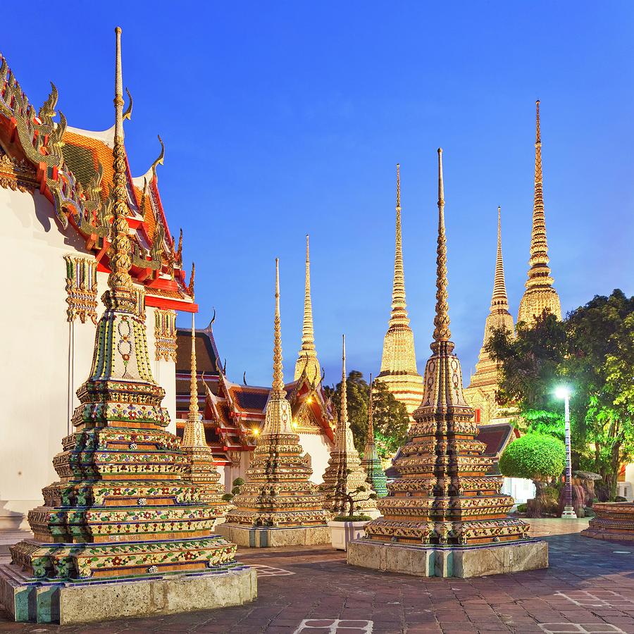 Thailand, Central Thailand, Bangkok, Wat Pho, Temple Of The Reclining Buddha Illuminated At Dusk #3 Digital Art by Luigi Vaccarella