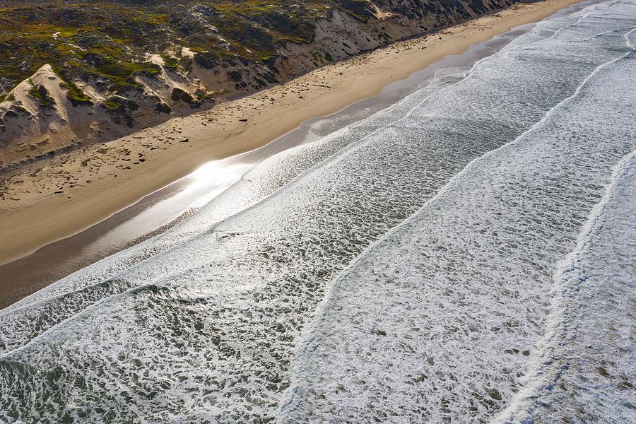Nature Photograph - The Pacific Ocean Washes Onto A Beach #3 by Ethan Daniels